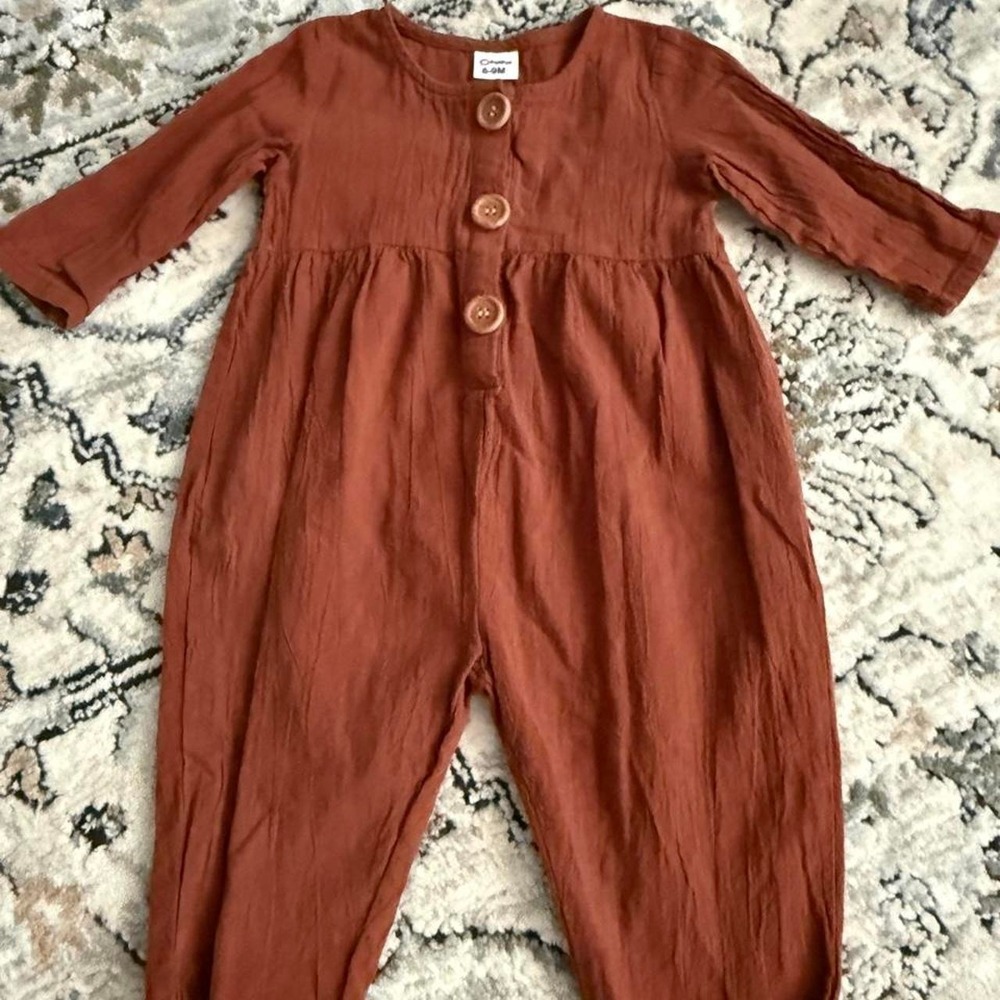 Pat Pat Brown baby jumpsuit with button detail. Size: 6-9 months
